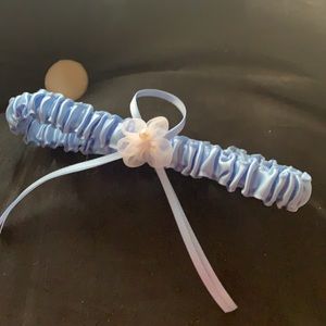 NWOT blue silk garter with bow